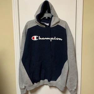 Vintage Champion blue and grey hoodie with champion logo on front